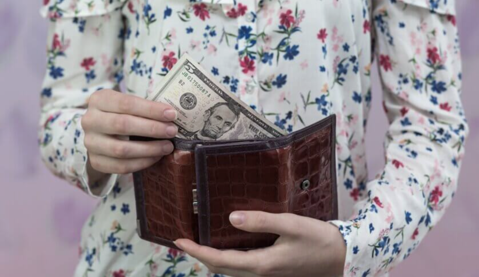 money pulled out of wallet